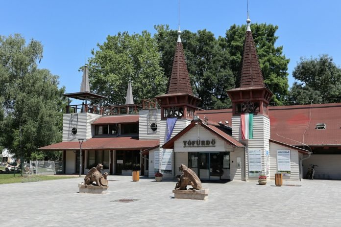 A large building with two towers on top of it