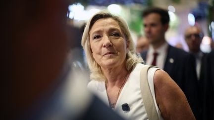 la présidente du groupe RN à l'Assemblée nationale, Marine Le Pen, au salon VivaTech, le 19 juin 2026. (SIMON WOHLFAHRT / AFP)